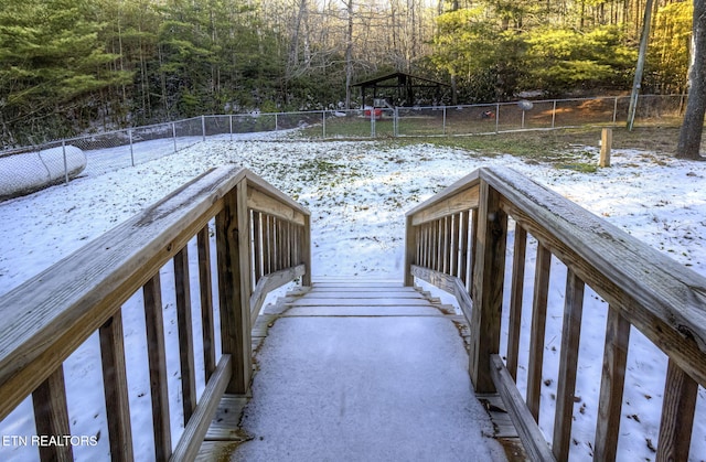 view of snow covered deck