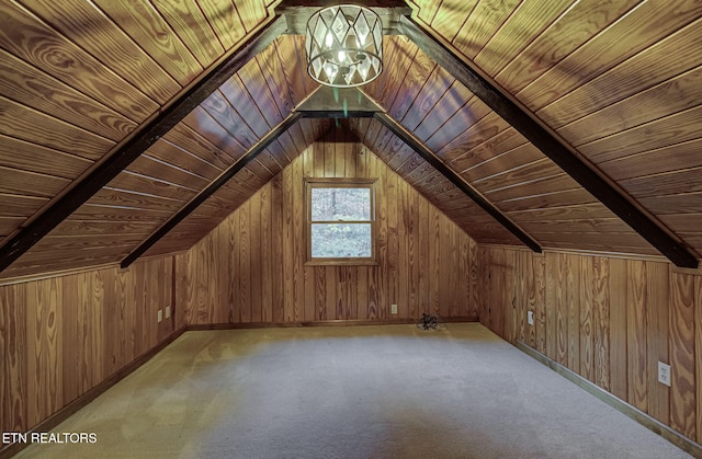 additional living space featuring light colored carpet, wooden walls, wooden ceiling, and vaulted ceiling with beams