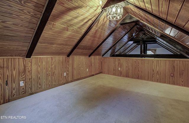 bonus room with wooden ceiling, wood walls, vaulted ceiling with beams, and carpet flooring