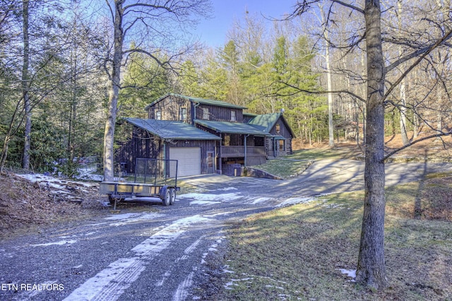 view of front of property with a garage