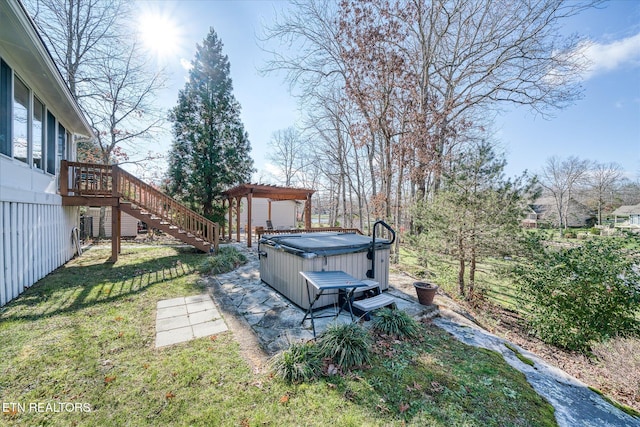 view of yard with a patio area and a hot tub