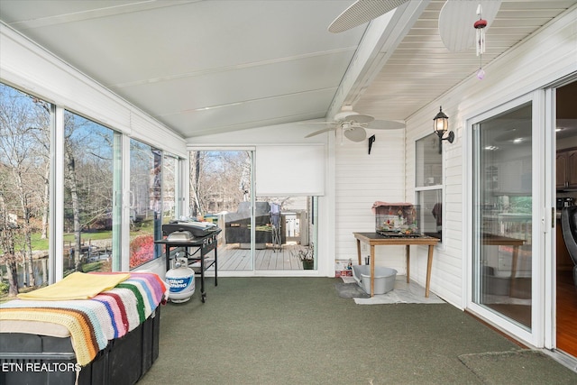 sunroom / solarium with vaulted ceiling with beams and ceiling fan