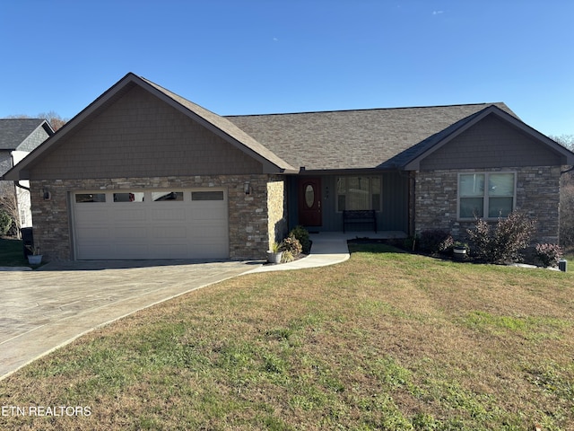 single story home featuring a front yard and a garage