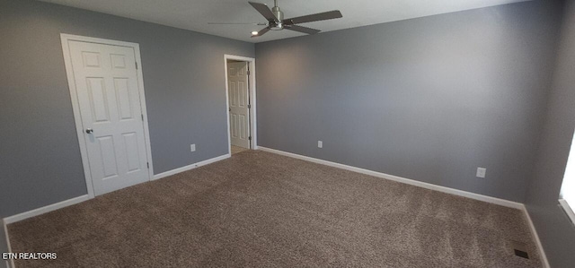 unfurnished bedroom featuring carpet floors and ceiling fan