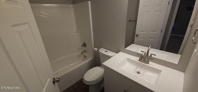 full bathroom with shower / bath combination, vanity, and toilet