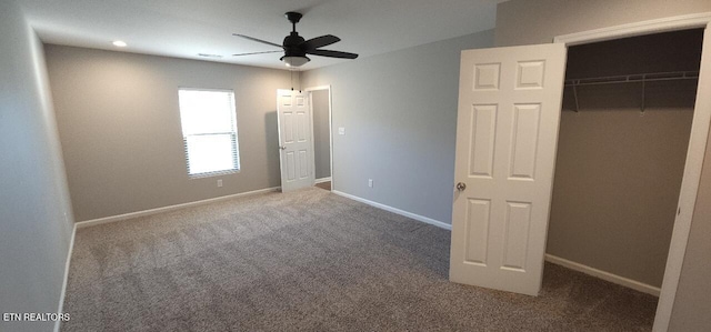 unfurnished bedroom featuring ceiling fan, carpet flooring, and a closet