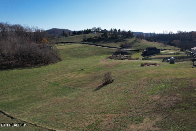 exterior space with a rural view