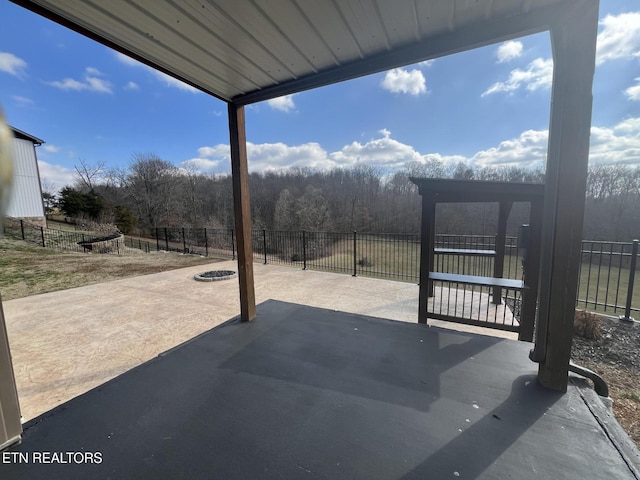 view of patio featuring an outdoor fire pit