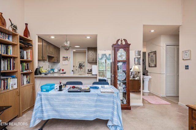 view of carpeted dining area