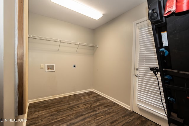 laundry room featuring hookup for a washing machine, dark hardwood / wood-style floors, and electric dryer hookup