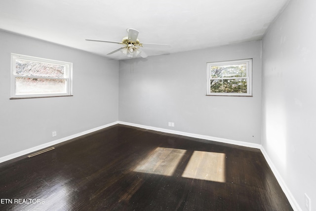 unfurnished room featuring hardwood / wood-style flooring and ceiling fan