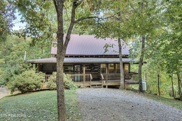 view of front of home with a deck