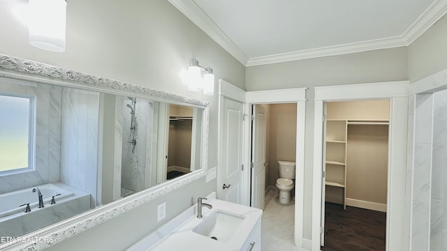 bathroom featuring toilet, ornamental molding, a tile shower, and a bath