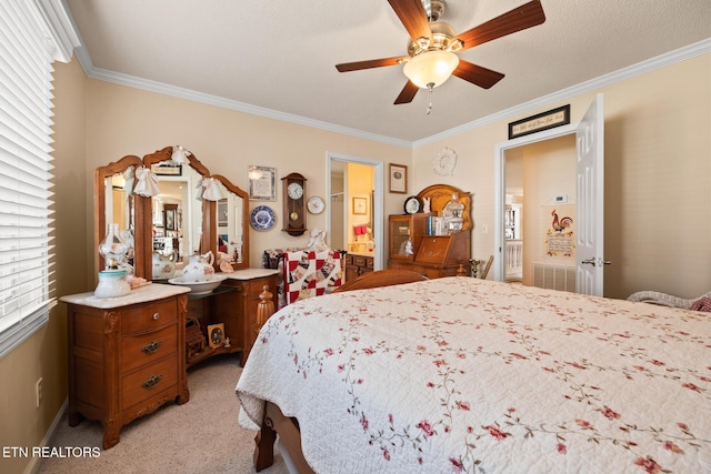 bedroom featuring light carpet, crown molding, ceiling fan, and a textured ceiling