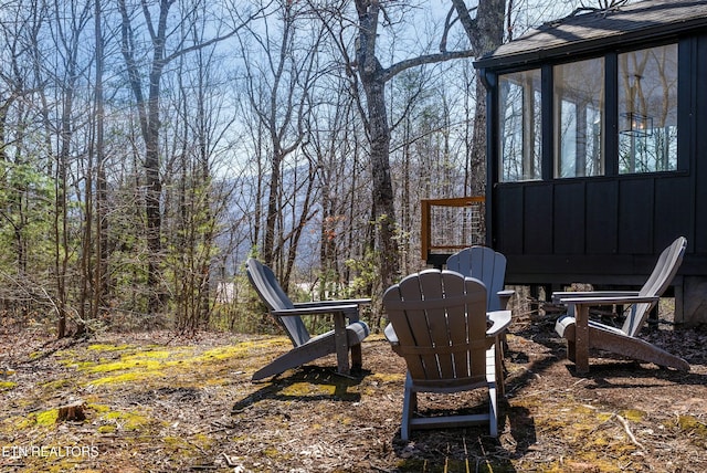 view of yard with a sunroom