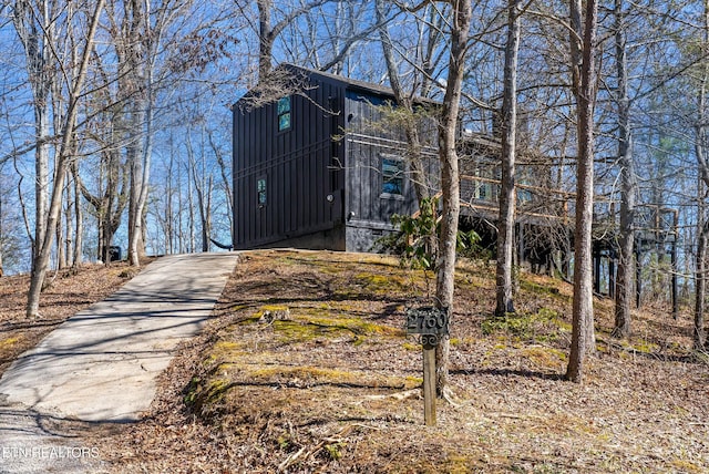 exterior space with concrete driveway