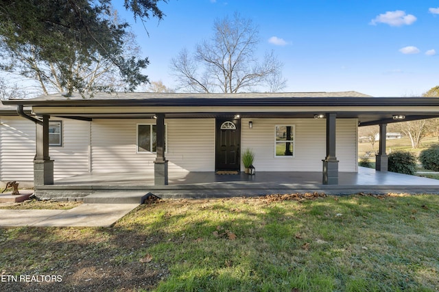 view of front of property with a front lawn and a porch