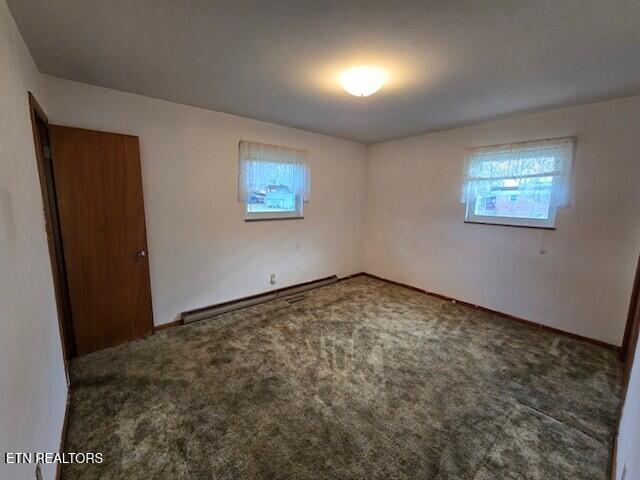 unfurnished bedroom with carpet