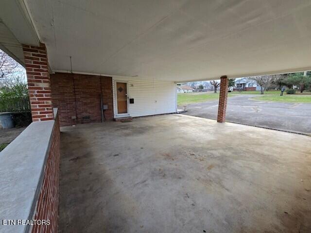 view of patio with a carport