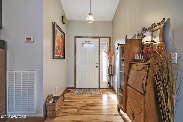 foyer with light hardwood / wood-style flooring