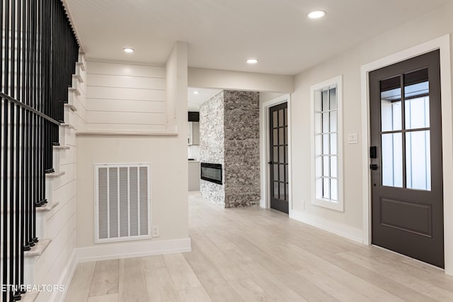 12000 S Fox Den Dr, Knoxville, TN 37934 - foyer with wood finished floors, a large fireplace, recessed lighting, and stairs