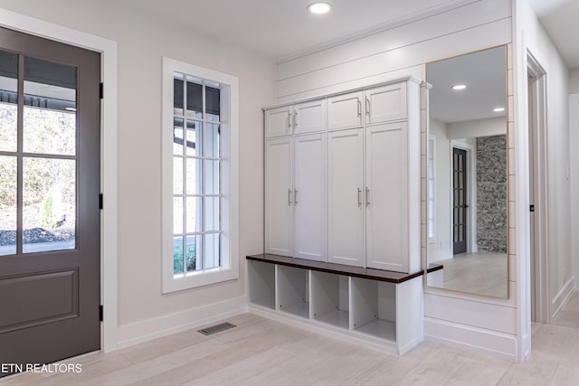 mudroom with light wood-type flooring