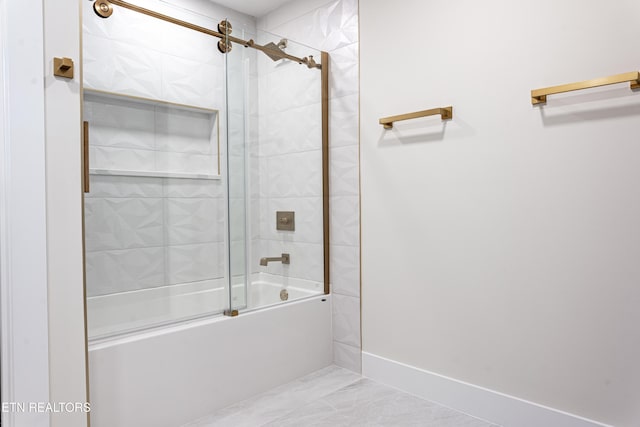 12000 S Fox Den Dr, Knoxville, TN 37934 - bathroom featuring combined bath / shower with glass door and marble look tile flooring