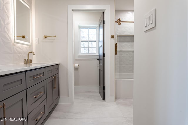12000 S Fox Den Dr, Knoxville, TN 37934 - full bathroom featuring vanity, washtub / shower combination, and marble look tile flooring