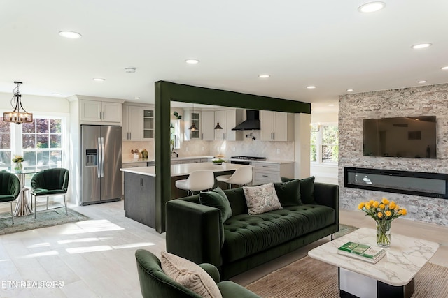 living room featuring a chandelier