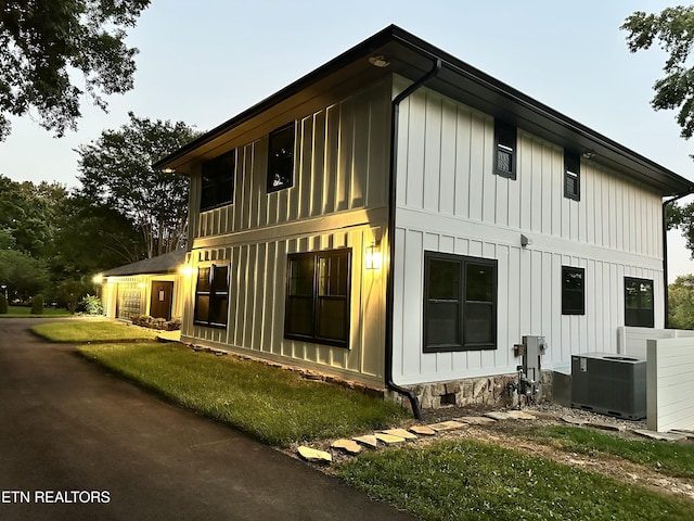 12000 S Fox Den Dr, Knoxville, TN 37934 - view of side of property featuring board and batten siding and a central AC unit
