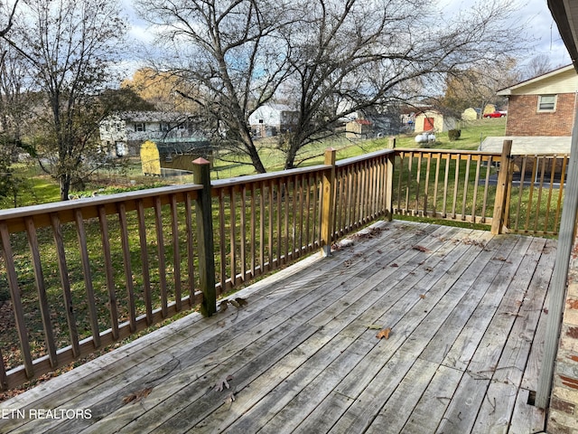 deck featuring a yard