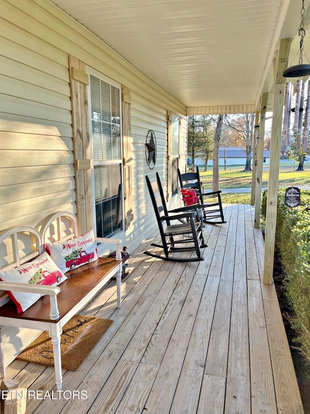 wooden terrace with covered porch