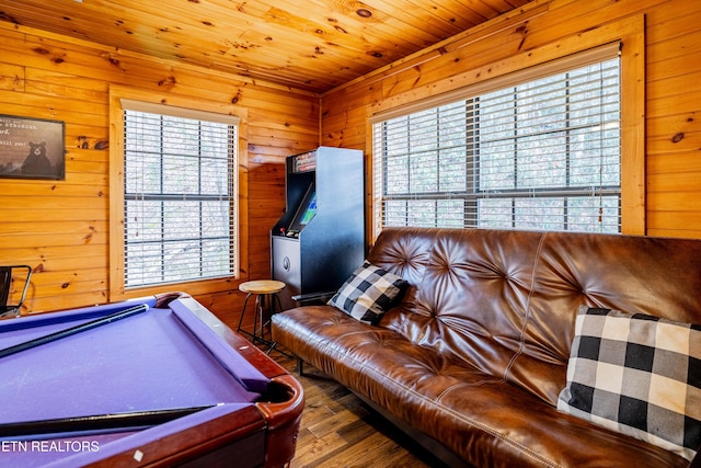 recreation room featuring hardwood / wood-style flooring, wooden walls, wood ceiling, and pool table