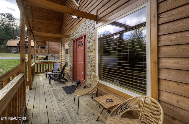 wooden deck featuring a porch