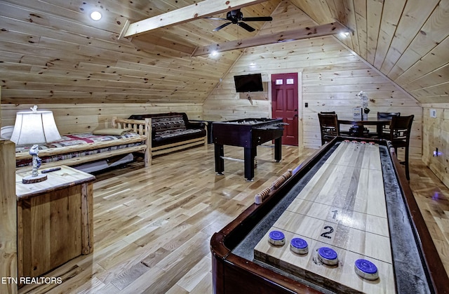 recreation room featuring wooden ceiling, light hardwood / wood-style flooring, wood walls, and lofted ceiling with beams