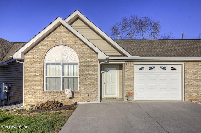 view of front of property featuring a garage