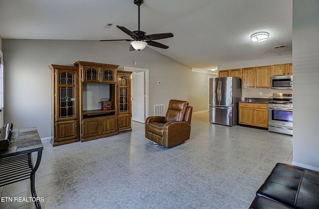 living room with ceiling fan and lofted ceiling