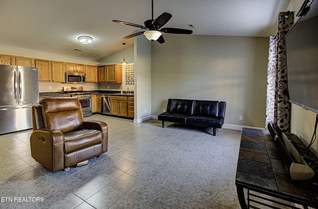 living room with light tile patterned flooring, high vaulted ceiling, ceiling fan, and sink