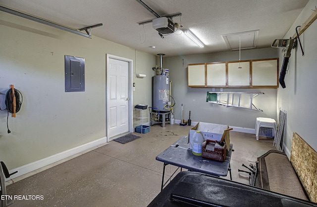 garage featuring electric panel, gas water heater, and a garage door opener