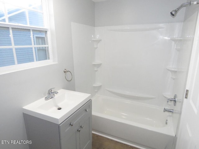 bathroom featuring shower / bathing tub combination and vanity