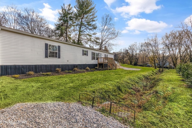 view of yard with a deck