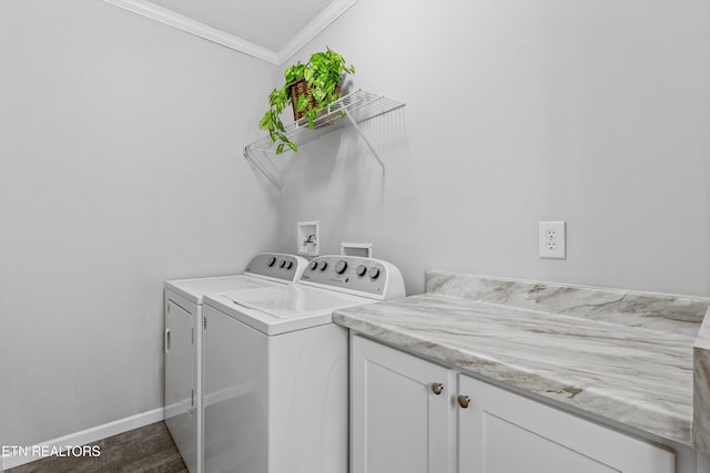 washroom featuring separate washer and dryer, crown molding, and dark wood-type flooring