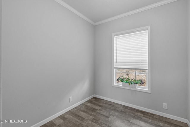 empty room with ornamental molding and dark wood-type flooring