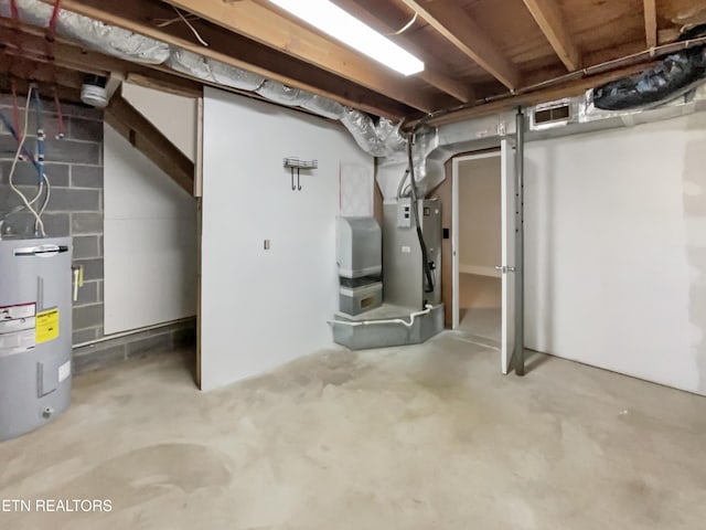 basement featuring electric water heater