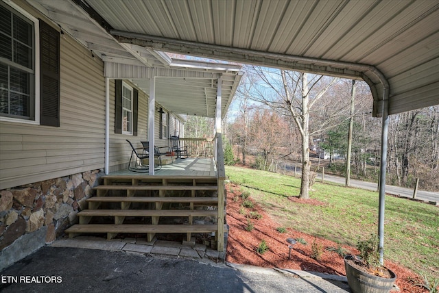 exterior space with a lawn and covered porch