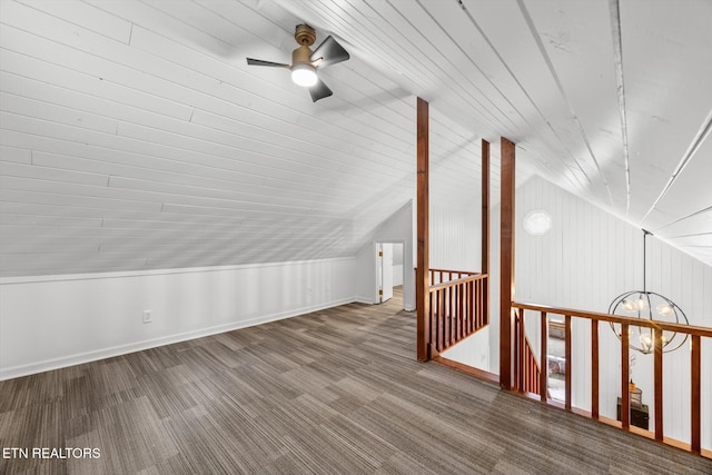 bonus room featuring wooden ceiling, ceiling fan with notable chandelier, wood-type flooring, and vaulted ceiling