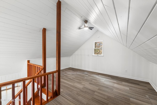 additional living space with dark hardwood / wood-style floors, vaulted ceiling, ceiling fan, and wood ceiling