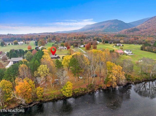 bird's eye view featuring a water and mountain view and a rural view