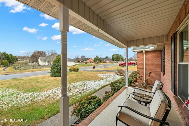 view of patio featuring a porch