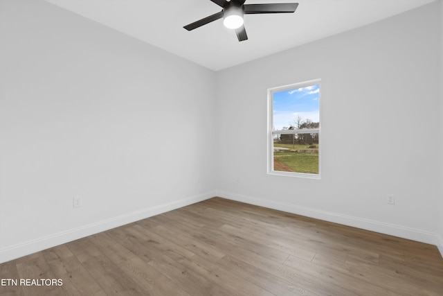 unfurnished room featuring ceiling fan and light hardwood / wood-style floors